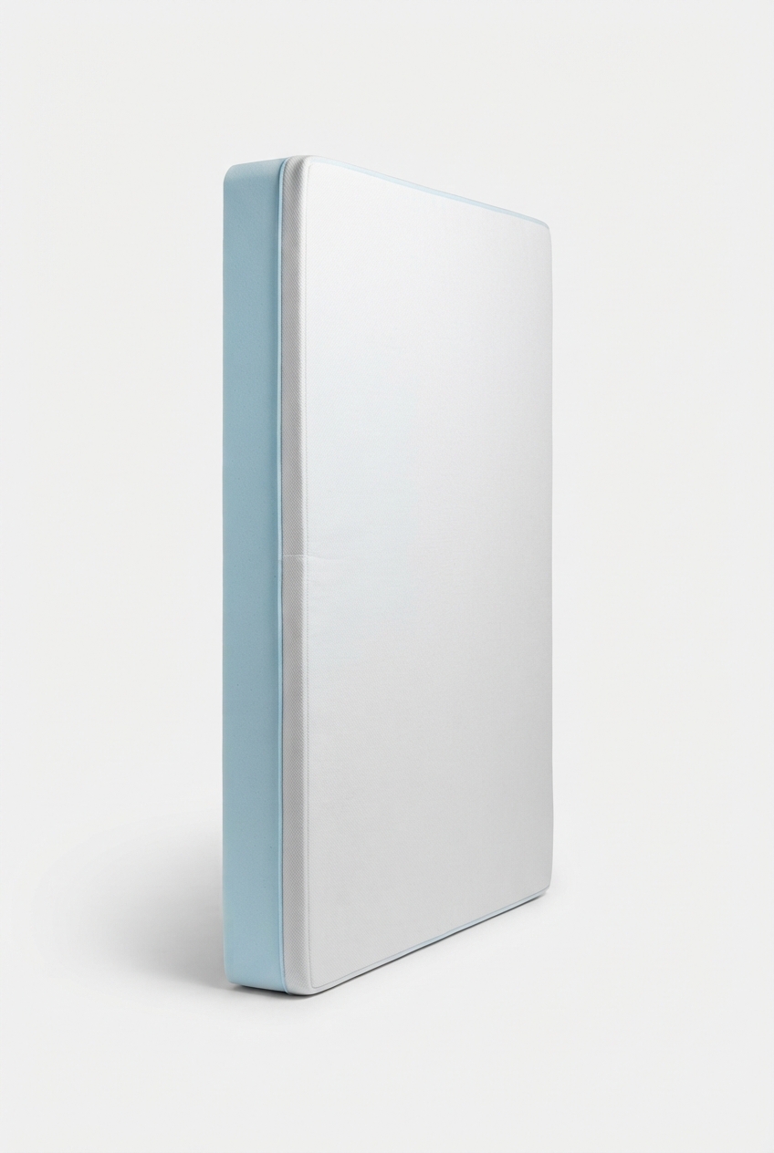 Twin foam mattress with lightblue border in studio scene